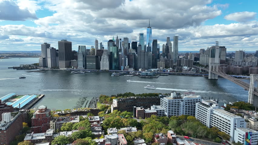 Lower Manhattan Skyline Across The East River In New York City, United States. Aerial Drone Shot