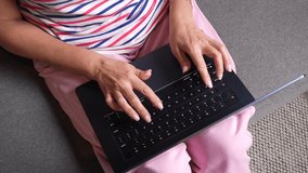 Close up of mature woman hands typing on laptop indoors. Concept of remote work, modern lifestyle, online communication, digital technology and productivity at home. - Powered by Shutterstock - Get 15% off with code: PIKWIZARD15