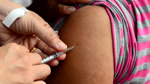 closeup of injection vaccine
