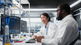 Multiracial engineers using scientific gear in research facility used for complex experiments. Diverse team of scientists in high tech laboratory doing genetics research using lab equipment, camera A - Powered by Shutterstock - Get 15% off with code: PIKWIZARD15