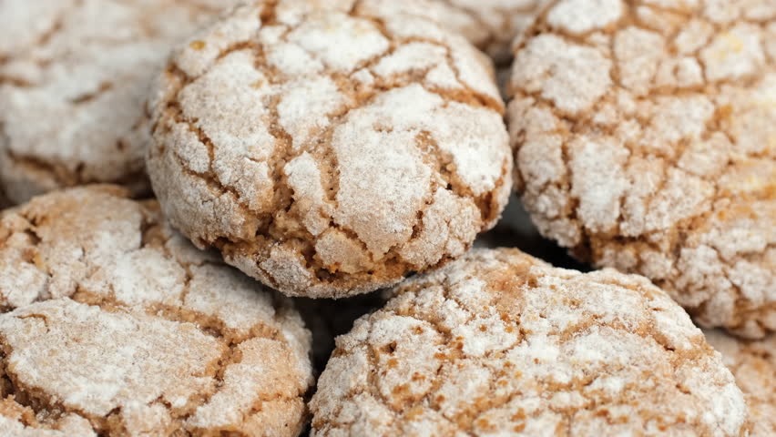 Heap of fresh cooked cookies with sugar powder