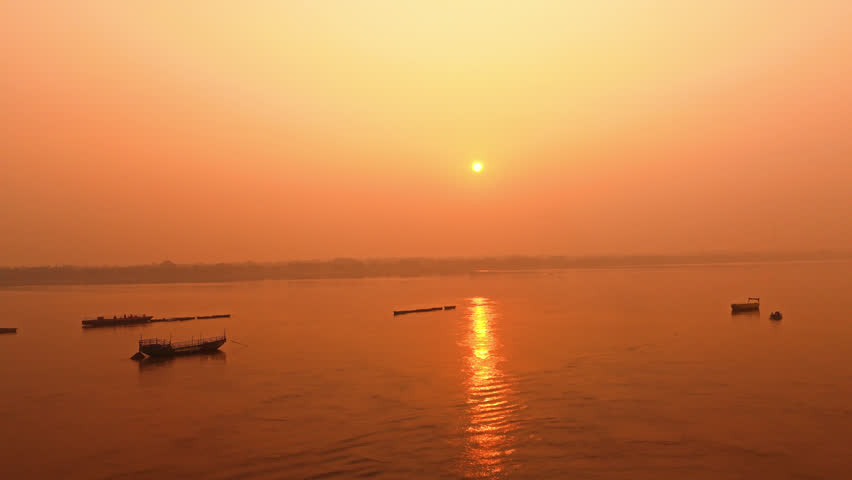 Aerial View of Morning Boats on the Ganga River in Kashi – Golden Sunrise Light Over the Sacred Waters of Varanasi