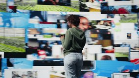 Jolly social media user enjoying free time browsing online clips on smartphone. Upbeat woman using phone to browse internet, looking at videos social network feed videos, camera A - Powered by Shutterstock - Get 15% off with code: PIKWIZARD15