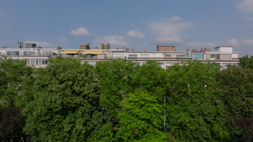 Historic Antwerp, Belgium showcases a stunning mix of modern and traditional architecture, surrounded by vibrant green spaces in a series of captivating aerial views