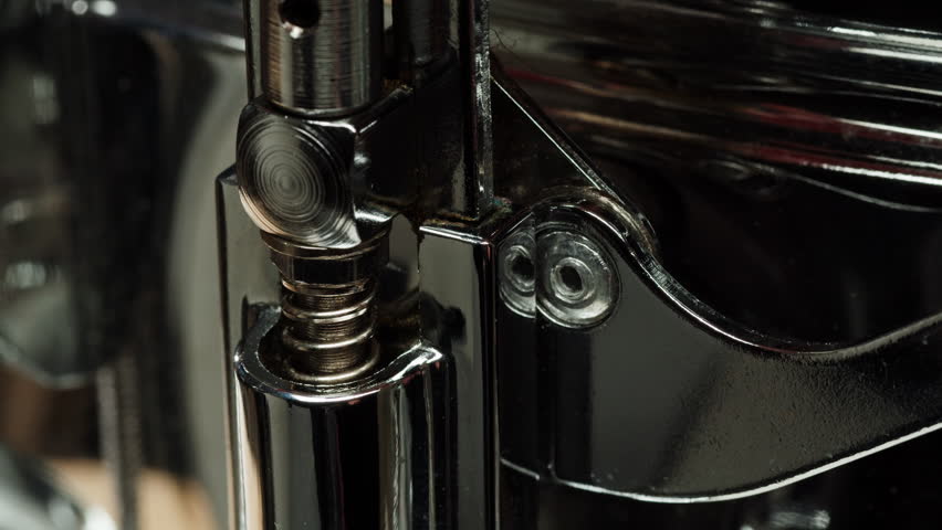 Close up of drum tuning key on drum edge