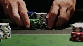 Game of poker in casino, taking place with poker chips and cards on a green table, gambling place, roulette jack pot.  - Powered by Shutterstock - Get 15% off with code: PIKWIZARD15