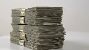 Fifty thousand dollars in cash rotating, highlighting wealth, finance, money concepts, and luxury in detailed 4K footage. - Powered by Shutterstock - Get 15% off with code: PIKWIZARD15