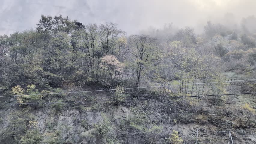 Fog and clouds in the mountains in autumn