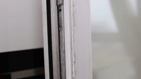 Close-up of a dirty window frame corner with visible dust and stains. Concept of home maintenance, neglected cleaning and household hygiene. - Powered by Shutterstock - Get 15% off with code: PIKWIZARD15