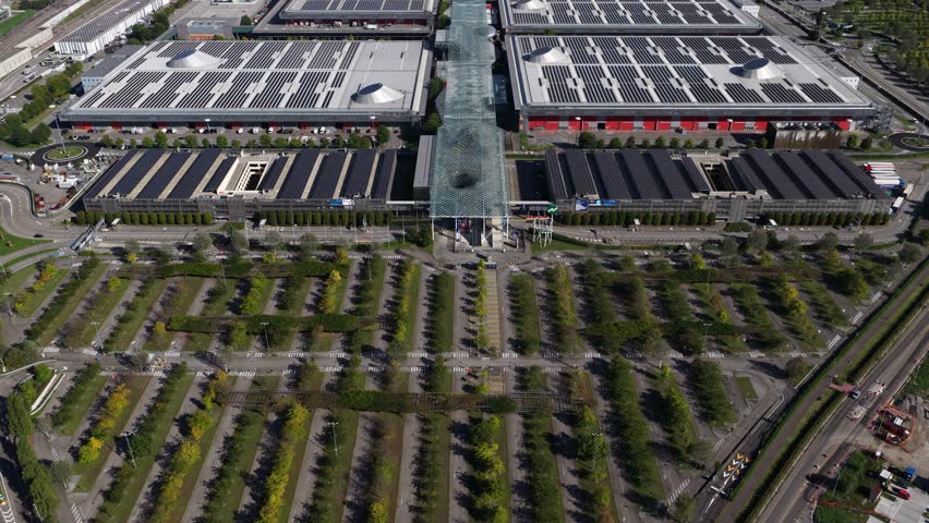Exhibition Event and congress center in Milan, Italy. Stage hall for large events in Milan, Italy. Aerial complex overview at daytime.