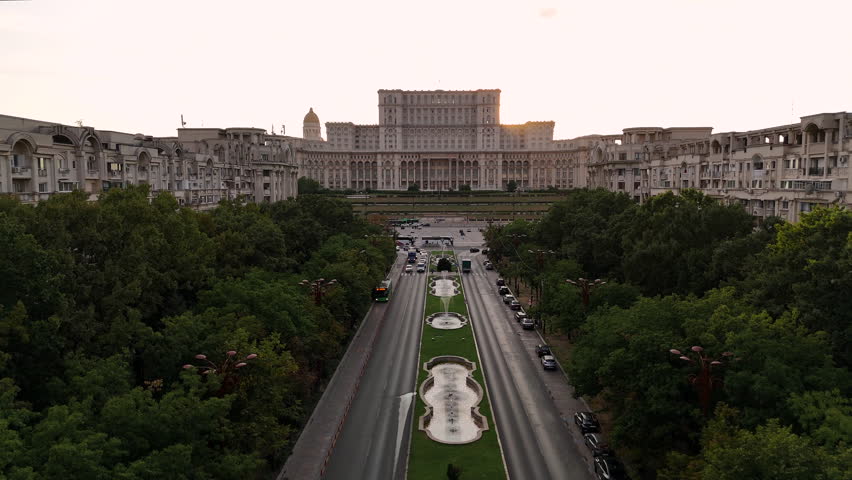 Palace of Parliament and Unirii Boulevard at sunset