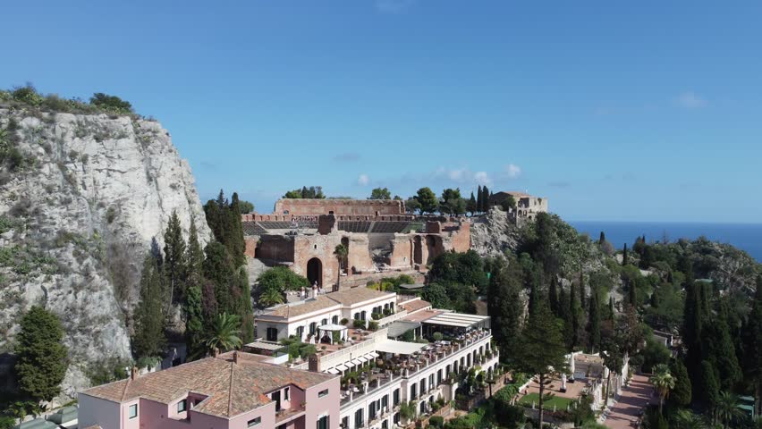 Teatro Antico di Taormina in Sicily, Italy - aerial drone view

