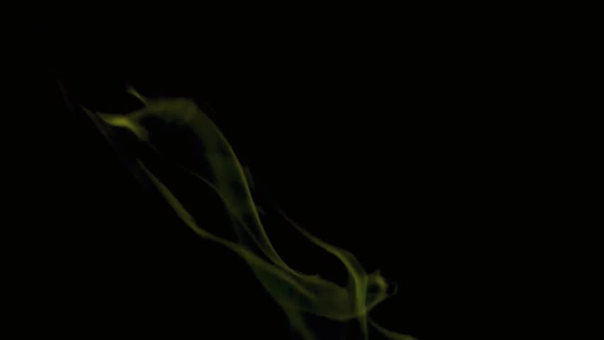 Ethereal yellow smoke wisps dance and swirl against a stark black background creating an abstract visual of movement and transition - Powered by Shutterstock - Get 15% off with code: PIKWIZARD15