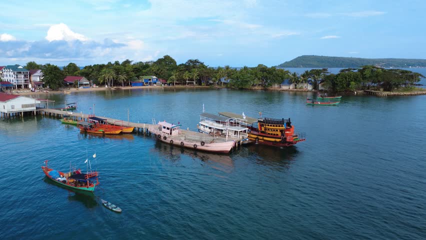 Koh Rong island fishing village pier, tropical Southeast Asia exotic, aerial drone