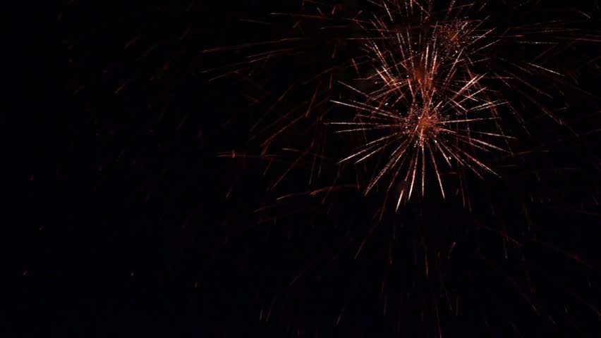 Red thin fireworks with black background