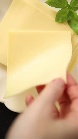 Gouda cheese slices hard cheese variety natural product tasty snack fresh delicious gourmet food background on the table rustic top view copy space