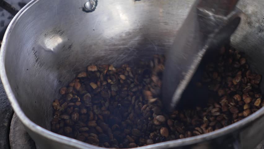 Coffee beans roasting process specialty fair trade eco plantation in Colombia