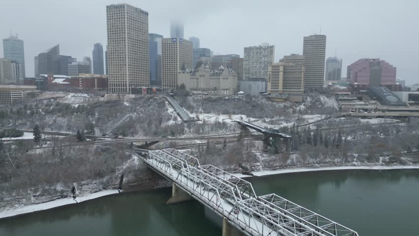 Edmonton in Snow, hotel macdonald, edmonton river valley, river boat, cn tower and downtown skyline drone aerial