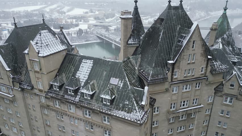 Edmonton in Snow, hotel macdonald, edmonton river valley, river boat, cn tower and downtown skyline drone aerial