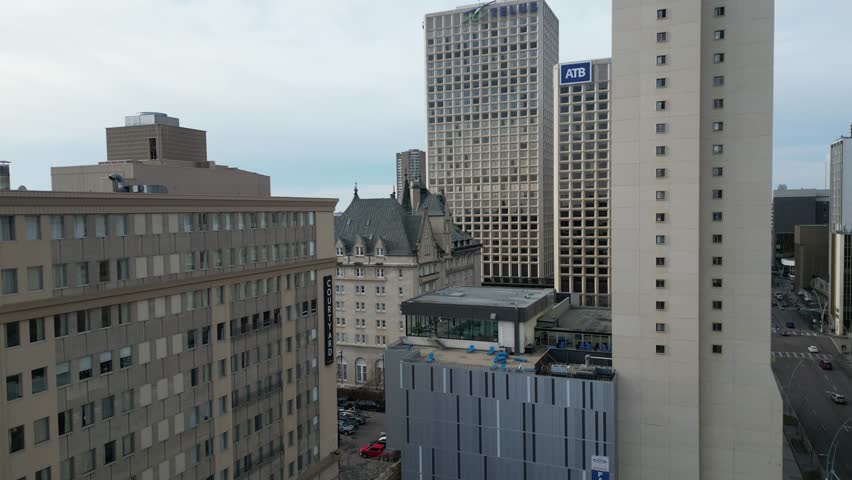 Edmonton in Snow, hotel macdonald, edmonton river valley, river boat, cn tower and downtown skyline drone aerial