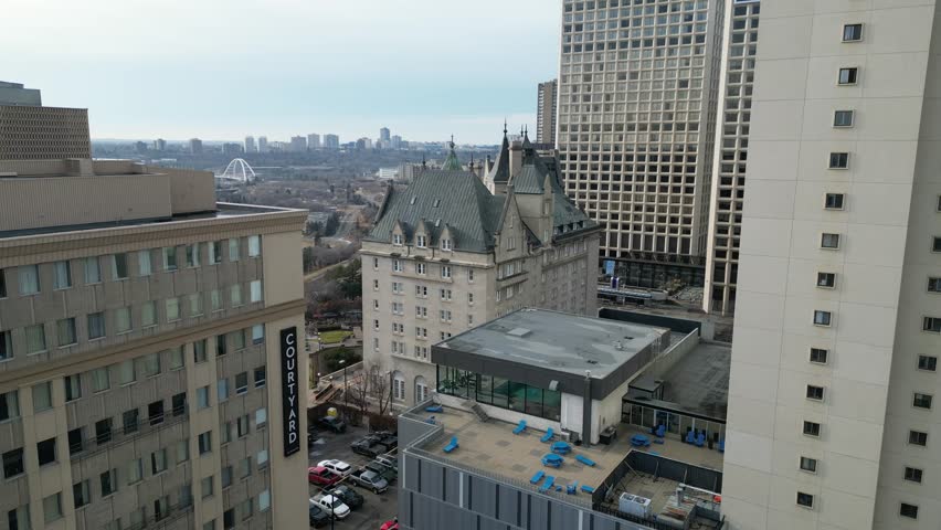 Edmonton in Snow, hotel macdonald, edmonton river valley, river boat, cn tower and downtown skyline drone aerial