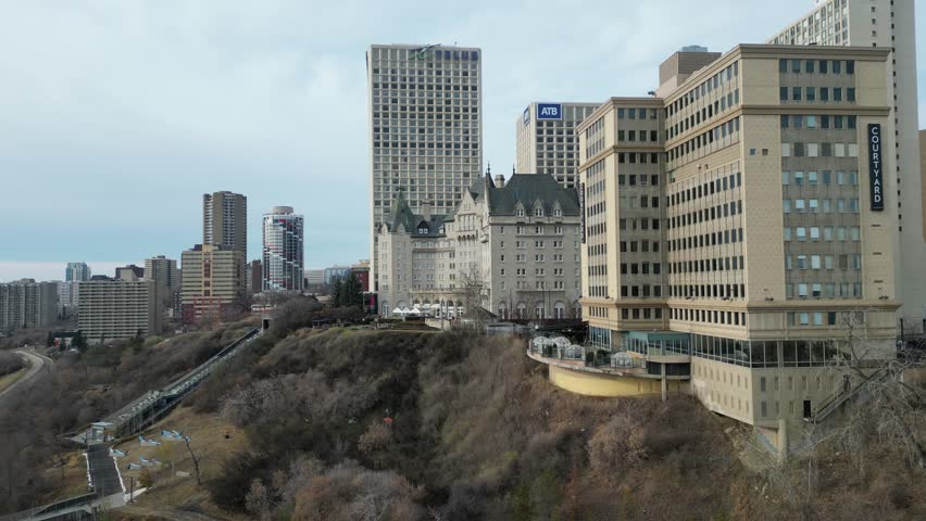 Edmonton in Snow, hotel macdonald, edmonton river valley, river boat, cn tower and downtown skyline drone aerial