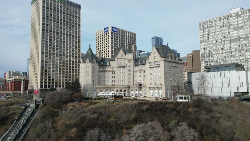 Edmonton in Snow, hotel macdonald, edmonton river valley, river boat, cn tower and downtown skyline drone aerial