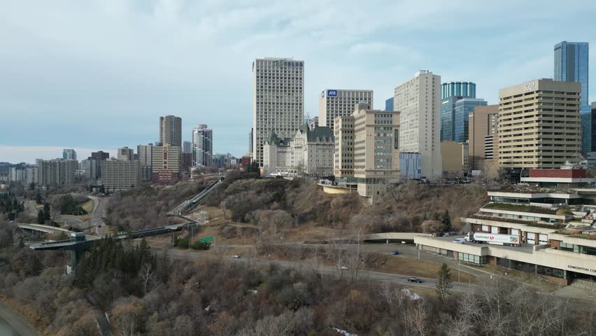 Edmonton in Snow, hotel macdonald, edmonton river valley, river boat, cn tower and downtown skyline drone aerial