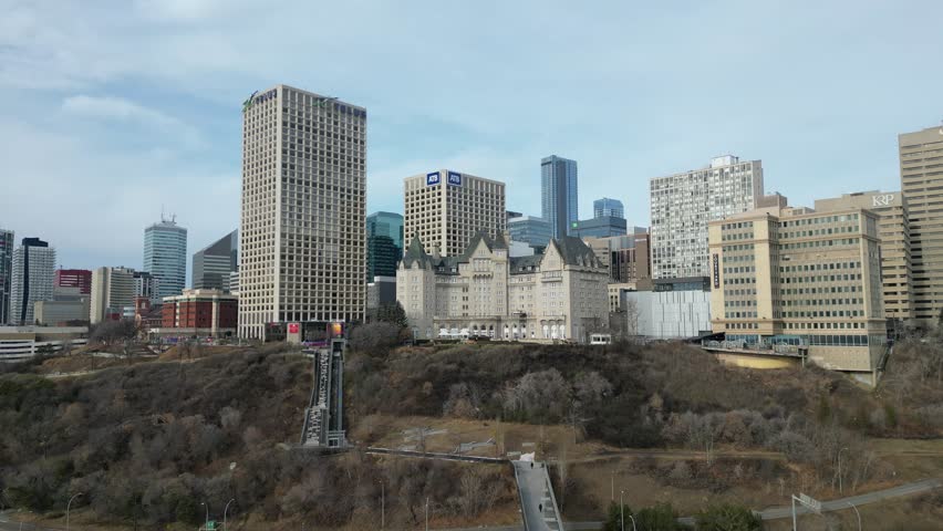 Edmonton in Snow, hotel macdonald, edmonton river valley, river boat, cn tower and downtown skyline drone aerial
