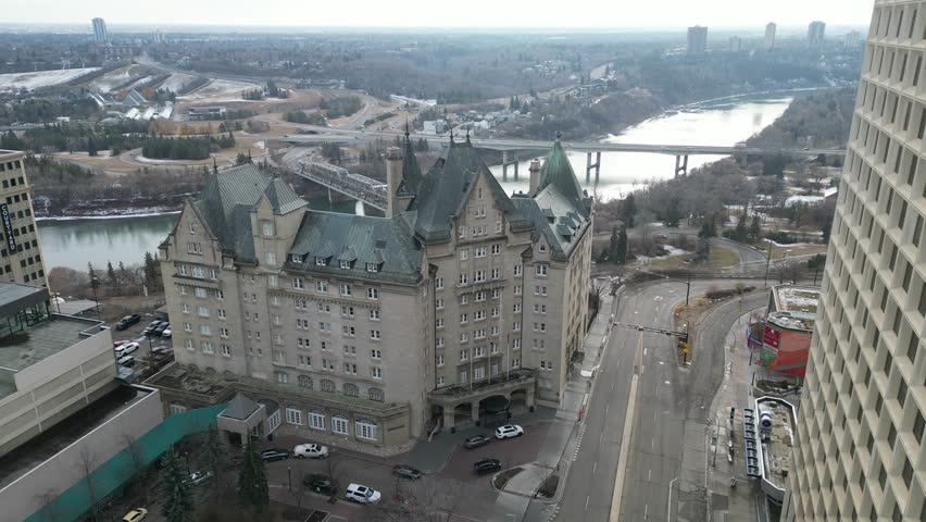 Edmonton in Snow, hotel macdonald, edmonton river valley, river boat, cn tower and downtown skyline drone aerial