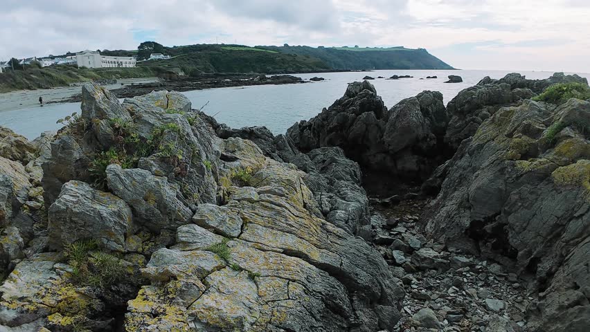 peaceful seaside landscape with natural elements, tranquil seaside scene featuring waves and cliffs