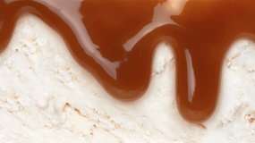 Drizzle caramel sauce on white ice cream, ice cream footage - Powered by Shutterstock - Get 15% off with code: PIKWIZARD15
