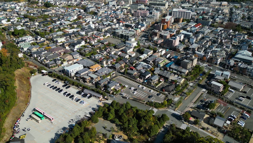 Aerial view overlooking the cityscape of Kita Ward, sunny day in Kyoto, Japan