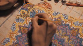 Girl draws a mandala. Close-up - Powered by Shutterstock - Get 15% off with code: PIKWIZARD15