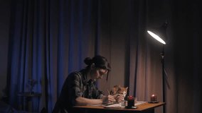 beautiful girl draws a mandala in a room with a ginger cat - Powered by Shutterstock - Get 15% off with code: PIKWIZARD15