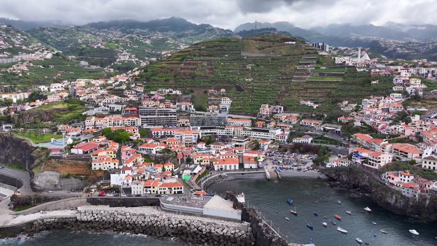 Charming fishing village of Câmara de Lobos on Madeira south coast, aerial