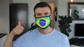 Man using a protective breathing mask with the Brazilian flag on it  - Powered by Shutterstock - Get 15% off with code: PIKWIZARD15