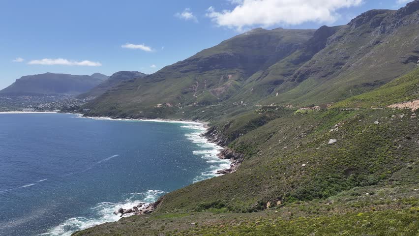 Beautiful rugged coastline of False Bay near Cape Town, South Africa - 4K Aerial View