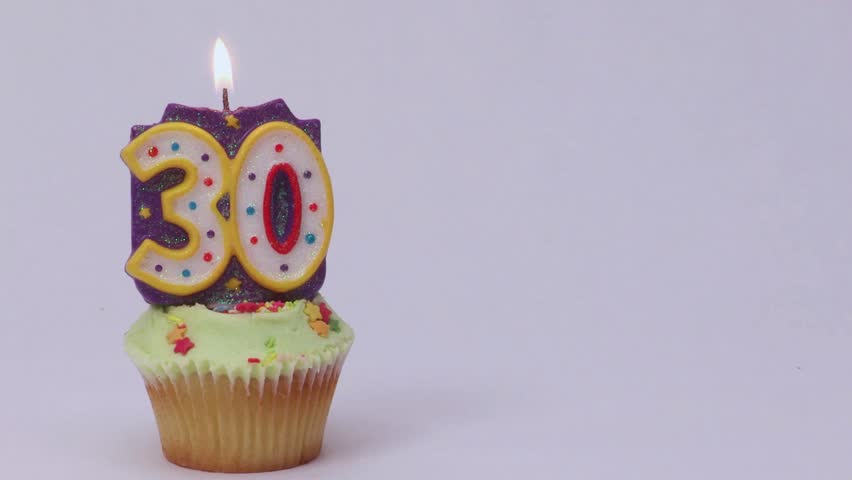 A beautifully decorated cake created for a 30th birthday celebration. A single candle burns brightly on top, symbolizing a milestone age and a wish for the future. - Powered by Shutterstock - Get 15% off with code: PIKWIZARD15