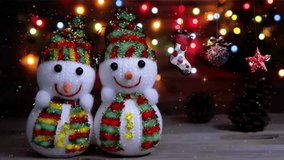 Merry Christmas Snowmen in Christmas Village Animation, Winter Wonderland Night Scene with Snowflakes, Festive Street Lights, Snowman, Christmas Tree, and Holiday Celebration Background, sstkchristmas - Powered by Shutterstock - Get 15% off with code: PIKWIZARD15
