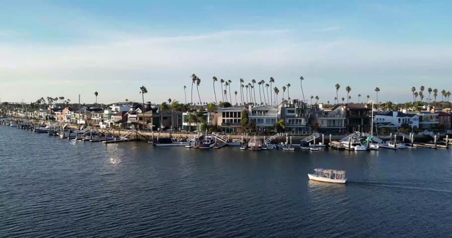 Aerial drone footage capturing the sunny Long Beach Harbor in California. Perfect for travel films, tourism videos, lifestyle content, and cinematic projects featuring California’s maritime beauty.