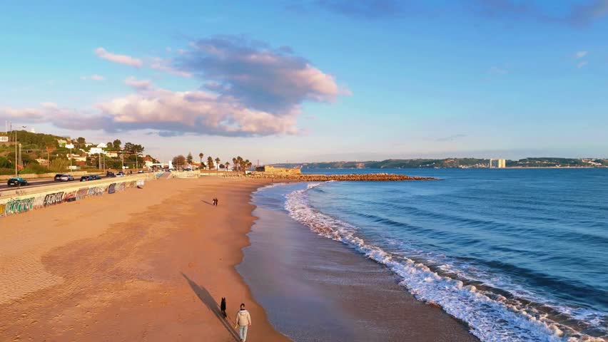 Aerial View of Beach and Coastline at Sunset