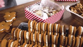 Lovingly homemade gingerbread and sugar cookies, half-dipped in rich chocolate, nestled in decorative Christmas tin boxes perfect for seasonal gifting. - Powered by Shutterstock - Get 15% off with code: PIKWIZARD15