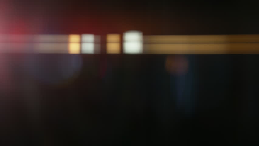 Real Shooted Cinematic Lens Flare Overlay on Black Background at 1000fps Slow Motion.