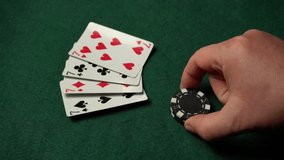 Four playing cards showing sevens, and a player hand placing a bet, create a cozy atmosphere for a gaming evening. - Powered by Shutterstock - Get 15% off with code: PIKWIZARD15