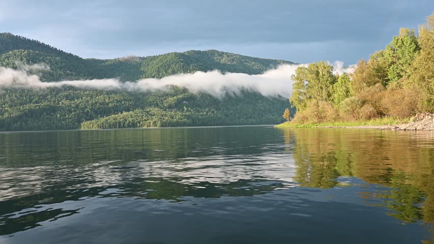 A delightful landscape of Lake Teletskoye in Altay, Russia. Beautiful summer nature landscape at during daytime

