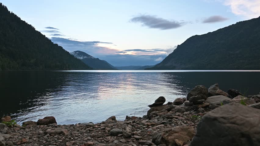 Landscape of Lake Teletskoye in Altay, Russia. Beautiful summer nature landscape at sunset
