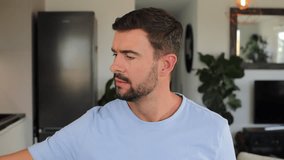 Terrified man holding a porcelain haunted doll  - Powered by Shutterstock - Get 15% off with code: PIKWIZARD15