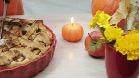 A family with young children celebrates Thanksgiving at home with apple pie and traditional dishes. The table is set. The concept is one of celebration, tradition, love, care, and respect.  happy. - Powered by Shutterstock - Get 15% off with code: PIKWIZARD15