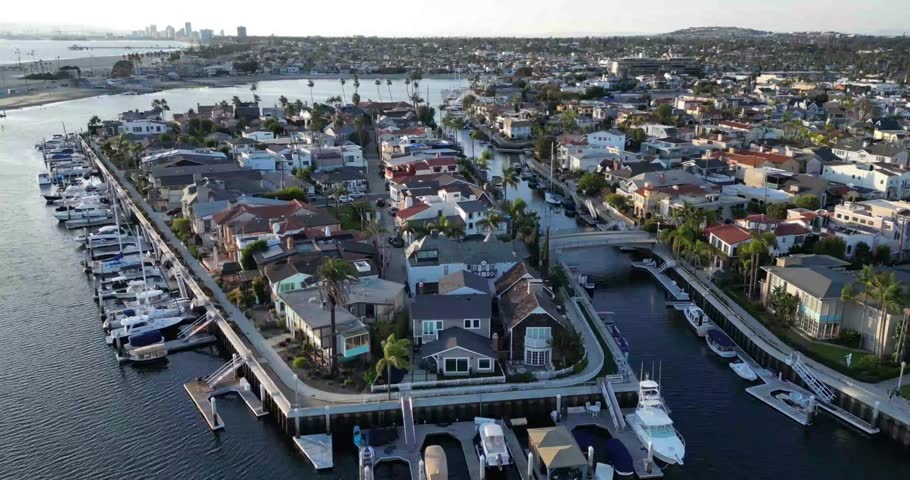 Beautiful aerial drone footage capturing Naples Long Beach Marina in California. Perfect for travel videos, tourism promotions, lifestyle content, real estate projects, and cinematic visuals.